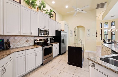 Pelican House | III Palms Oasis - 4/3 Electric Heated Pool & Spa with Gulf Access, Tiki Hut and Boat Dock