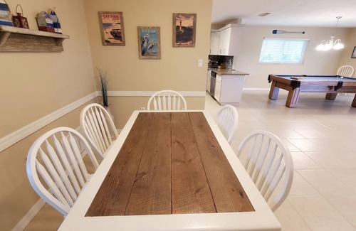 South Patrick Shores House | Immaculate beach house with amenities and heated pool - 5 min bike ride to beach