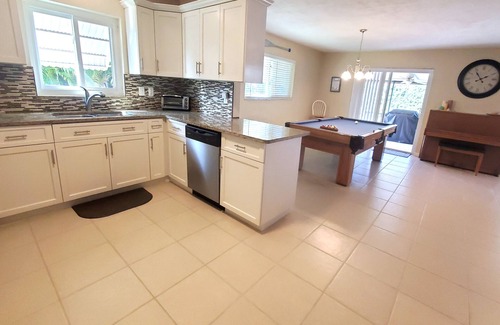 South Patrick Shores House | Immaculate beach house with amenities and heated pool - 5 min bike ride to beach