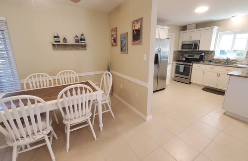 South Patrick Shores House | Immaculate beach house with amenities and heated pool - 5 min bike ride to beach