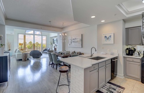 Shelter Cove Villa | Immaculately updated harbor view penthouse condo near beach!