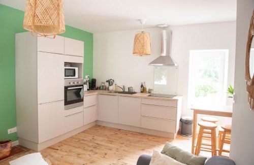 Rive Droite Apartment | Immeuble de 3 appartements avec cour intérieure