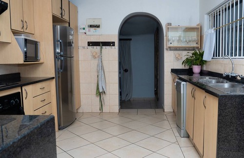 Greater Johannesburg Metropolitan Area House | Impeccable 3-Bed House in Joburg, 6km near Sandton, close to Gautrain.