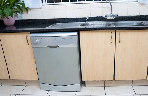 Greater Johannesburg Metropolitan Area House | Impeccable 3-Bed House in Joburg, 6km near Sandton, close to Gautrain.