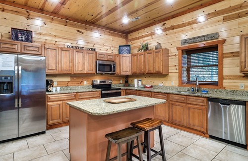 Gatlinburg - Pigeon Forge Cabin | Impressive, 6 Bedroom Cabin with PRIVATE HEATED POOL!