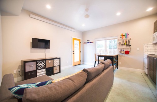 Salida House | In Salida, a Modern Ground Floor Suite. Private, custom flagstone patio & yard.