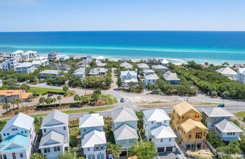 SeaNest Village House | includes golf cart! SeaNest stunner with Gulf views, 4 adult bikes. EV charger