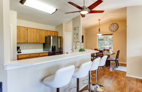 Three Rivers House | Incredible Riverside Home, River Views and Access, Huge Deck, Bikes, Close to Golf, Courts, and Pool