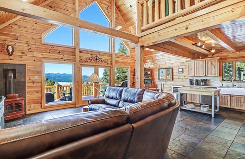 Angel Fire House | Incredible Views! Stunning log home w/wrap around deck and covered porch