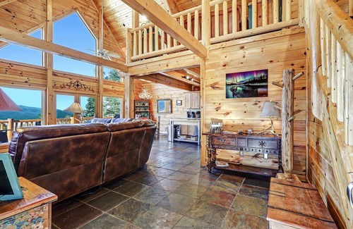 Angel Fire House | Incredible Views! Stunning log home w/wrap around deck and covered porch