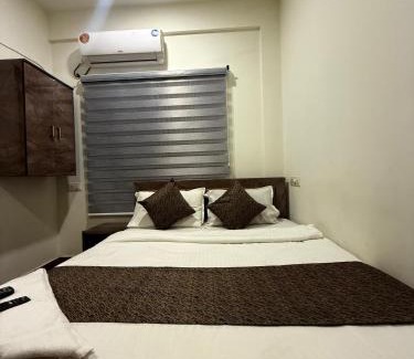 Shenoys Hotel | Indeo Residency