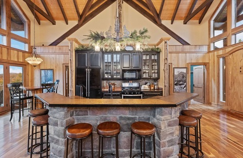 Gatlinburg - Pigeon Forge Cabin | Indigo Falls ~ 8BR w/Golf Simulator, Indoor Cave Pool, Hot Tub, Game Room, Theater, & Views!