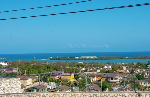 Falmouth House | Indulge in a breathtaking getaway as you escape to a magnificent vacation home.