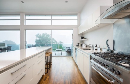 Akaroa House | Indulge in the cinema built for two, or a hot bath under the stars . Relax!