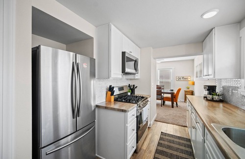 North of Grand House | Ingersoll Immersion - 4BR city gem with game table; near all the excitement!