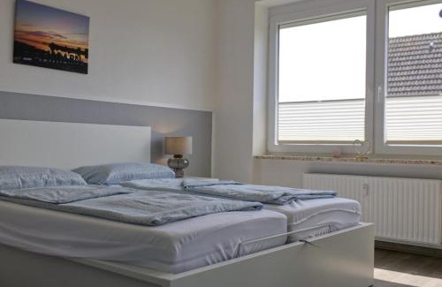Neue Tiefe House | Inselblume 58 - Ferienwohnung mit Balkon in Neue Tiefe