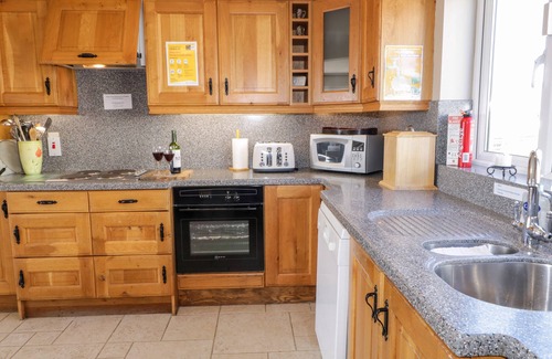 Gortnalughoge House | INVERBEG COTTAGE 1, pet friendly, with open fire in Downings