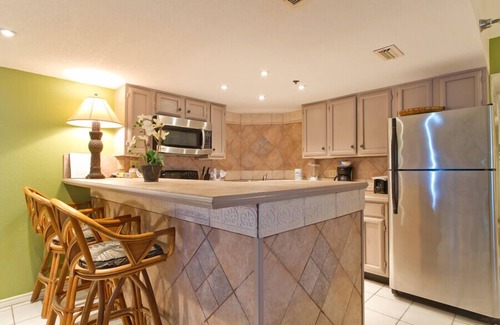 South Padre Island Condo | Inverness 800-Tropical furnishings;Beachfront balcony & pool
