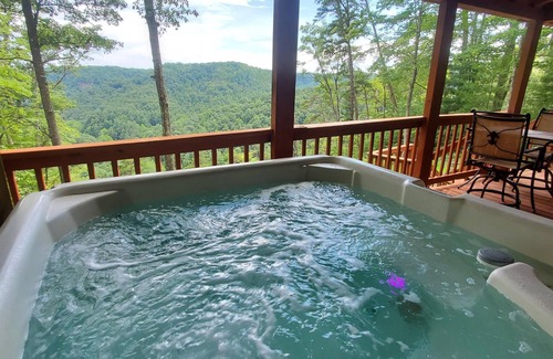Rogers Cabin | Inviting and charming, 3-BR, 2-BA log cabin with phenomenal view! King Beds.