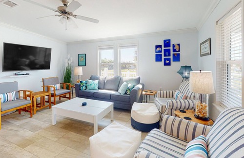 Port St. Joe House | Inviting home 1 block from the beach with screened porch, AC, & W/D