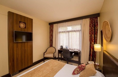 Nairobi Hotel | Inviting Room with Full Access to Spa & Wellness Center for Ultimate Relaxation