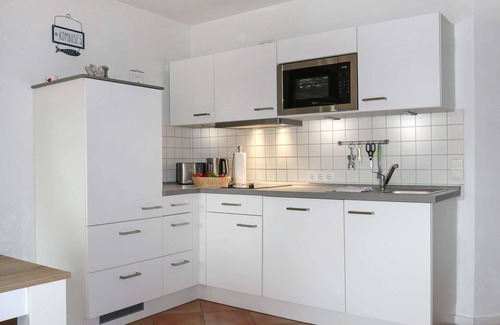 Neuensien Apartment | Inviting vacation apartment in the Seedorf vacation park with balcony and playground