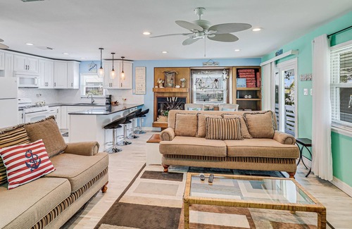 Palm Harbor House | Inviting waterfront home with balcony, full kitchen, W/D, & dog-friendly