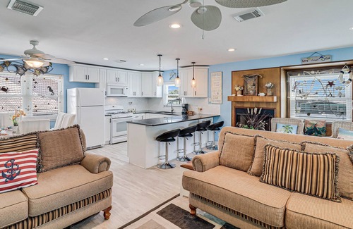 Palm Harbor House | Inviting waterfront home with balcony, full kitchen, W/D, & dog-friendly