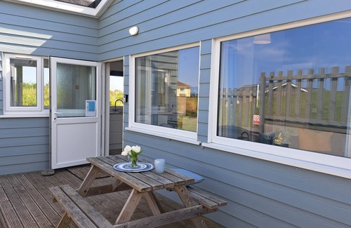 Hayle Apartment | Irene sits amongst the dunes, just a short walk to the three miles of golden, sandy beach below