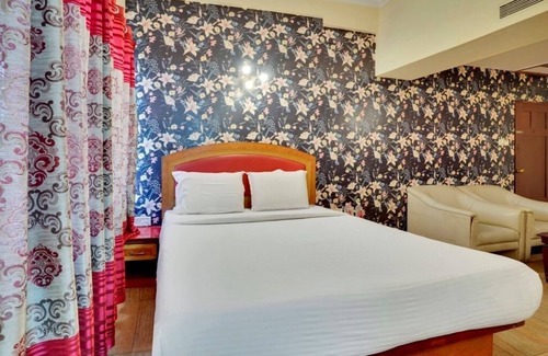 Rajajinagar Hotel | iROOMZ Aura Inn