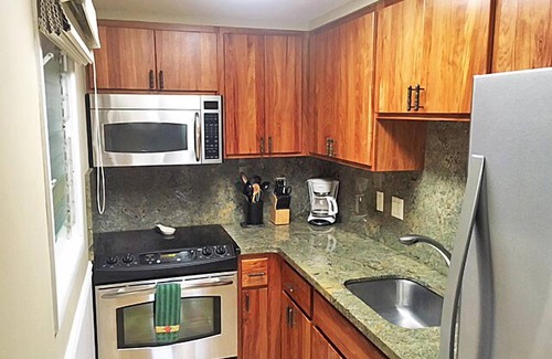 Poipu Condo | Island furnishings add to the tropical ambience of this studio-style condo.