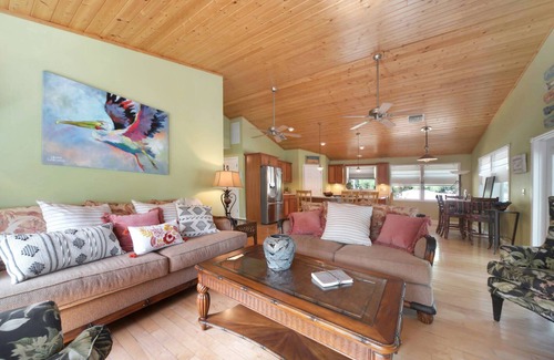 Saint James City House | Island Home within the Pines and Palms; Kayaks, Bikes, and Inviting Porches~