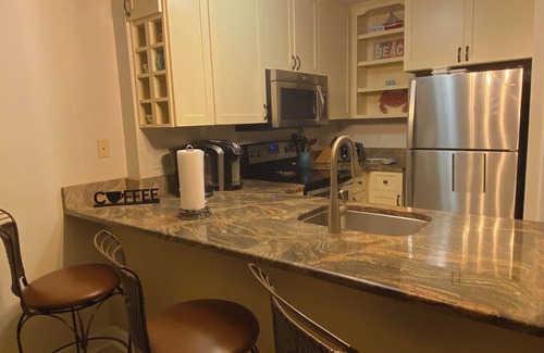 Fort Walton Beach Condo | Island Sands 208 - Spectacular views, beachfront, and a full kitchen,