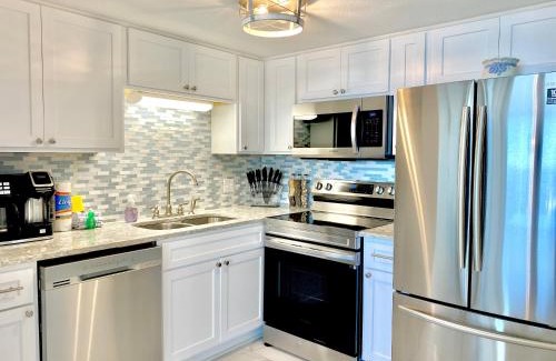 Gulf Shores House | Island Winds East 202 by ALBVR - Beautifully renovated beachfront condo & steps away from Hangout & more!