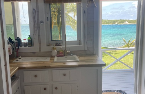 Dunmore Town Cottage | Islander Turtle Peek - Stunning new waterfront tiny-cottage overlooking harbour