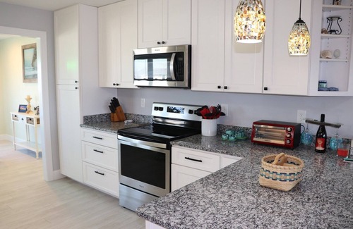 Emerald Isle Cottage | Isle N Joy 4BR, 2BA Steps from the Beach with Ocean & Sound Views