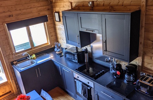 Llanfairpwllgwyngyll Cabin | Isle of Anglesey - cute dog friendly cosy cabin with dedicated EV charging
