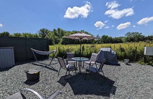 Llanfairpwllgwyngyll Cabin | Isle of Anglesey - cute dog friendly cosy cabin with dedicated EV charging