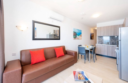 Bugibba Apartment | Islet Promenade Seafront 1 Bedroom Apartment with 2 seaview balconies