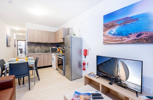 Bugibba Apartment | Islet Promenade Seafront 1 Bedroom Apartment with 2 seaview balconies