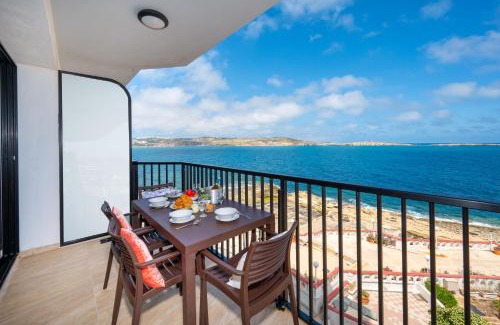 Bugibba Apartment | Islet Promenade Seafront Apartment with large Corner Terrace by Getawaysmalta