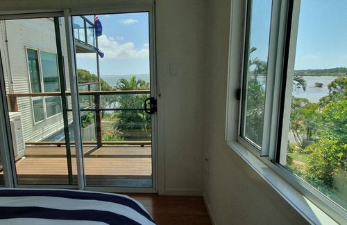 Barney Point Apartment | Jan's pet friendly fully furnished unit with harbour views and sea breezes