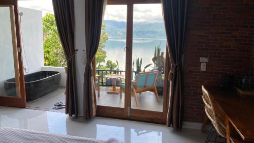 Ambarita Hotel | Janji Maria Cottage