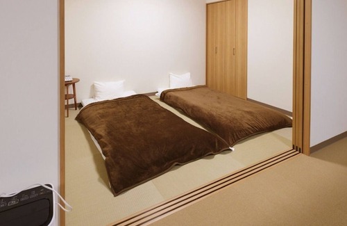 Yamanakako House | JapaneseWestern style family room with attached b / Minamitsuru-gun Yamanashi