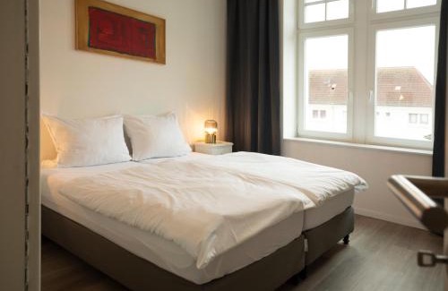 Dortmund Apartment | JayBnB - Apartment direkt am Hafen mit Terrasse und UHD TV