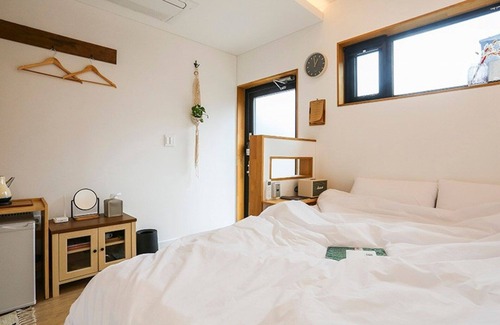 Gujwa House | Jeju Black Stone Pension
