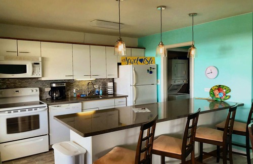 Estate Golden Rock Condo | Jewel of the Isle - 2 bed/2 bath seaside condo- beach and pool.