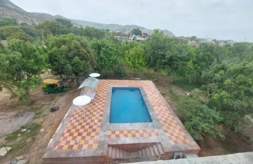 Jaipur Resort | Jhalana Retret Rooms ,Farm ,Pool, Mountain view