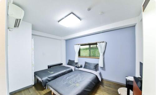 Shinsekai Apartment | JOJOのTC House通天閣新世界1分 関西空港難波大阪城直行 日本橋黒門徒歩圏内 USJ1回乗換