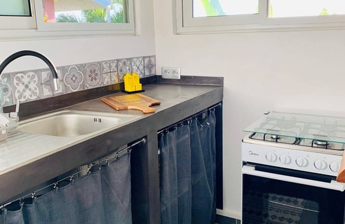 Punaauia House | Joli bungalow confortable dans une résidence sécurisée.